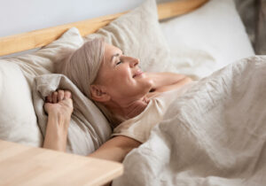 Woman waking up after restful sleep